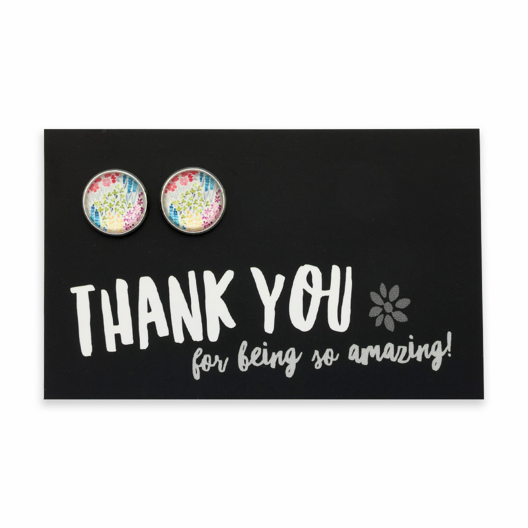 Colorful floral earrings on a black card with 'Thank you for being so amazing!' text