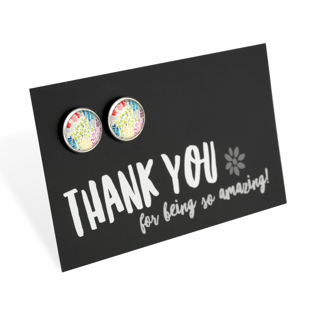 Colorful floral earrings on a black card with 'Thank you for being so amazing!' text