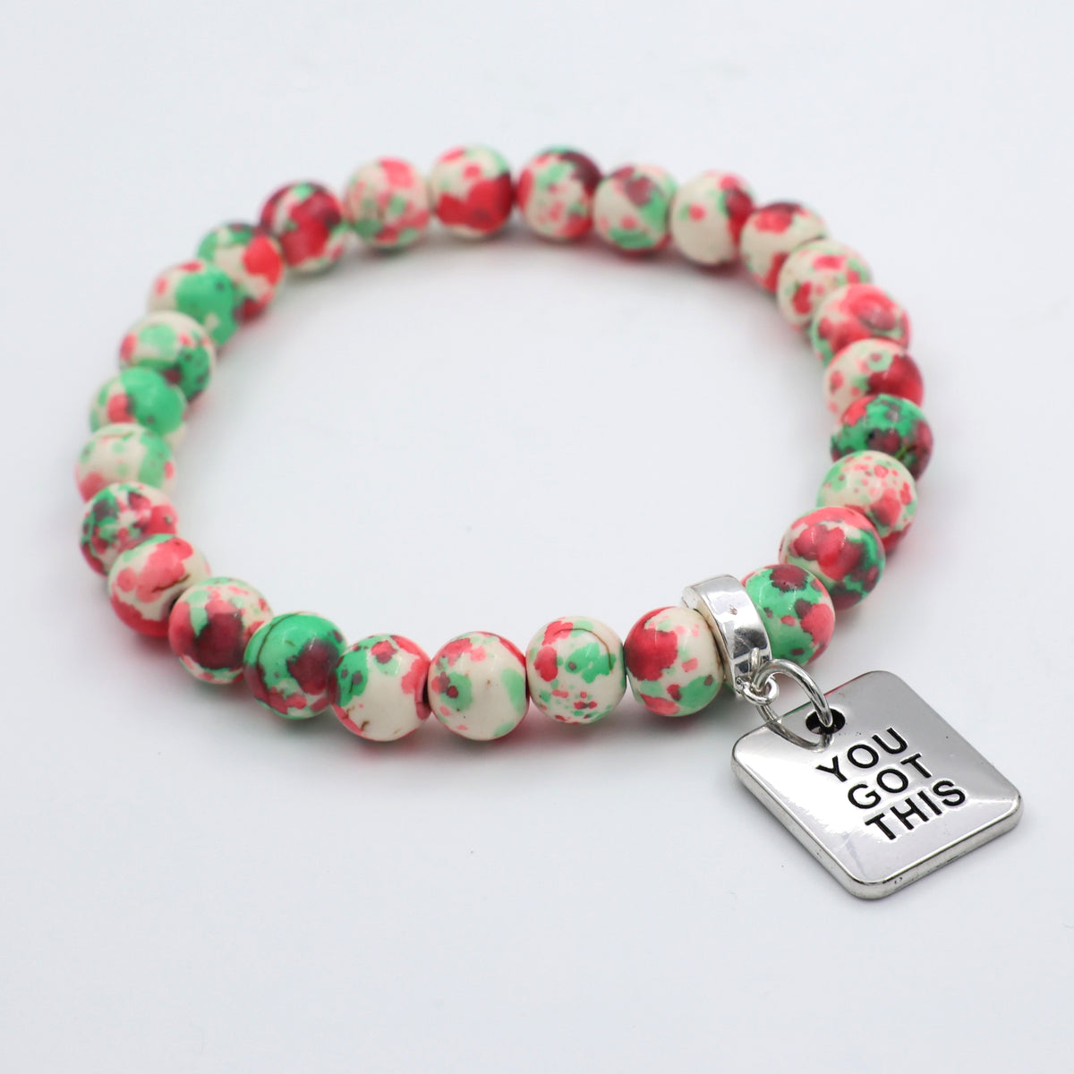 Beaded bracelet with a 'You Got This' charm on a light gray background