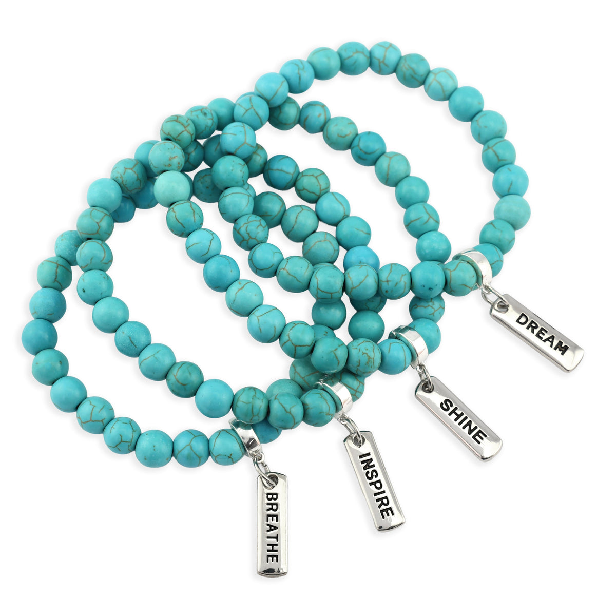 Turquoise beaded necklace with silver inspirational charms on a white background