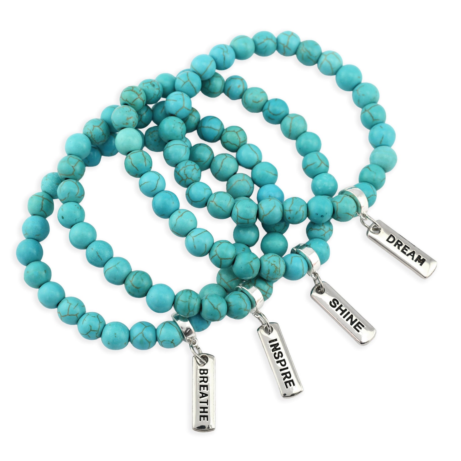 Turquoise beaded necklace with silver inspirational charms on a white background