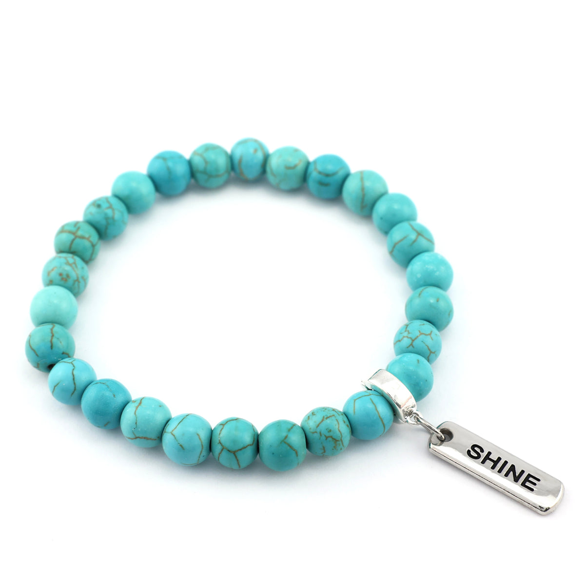 Turquoise beaded bracelet with a 'SHINE' tag on a white background