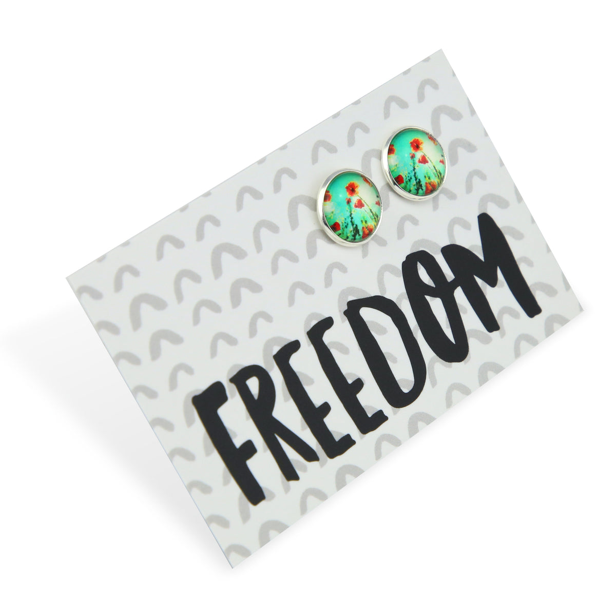 Earring card with floral earrings and 'FREEDOM' text on a white background
