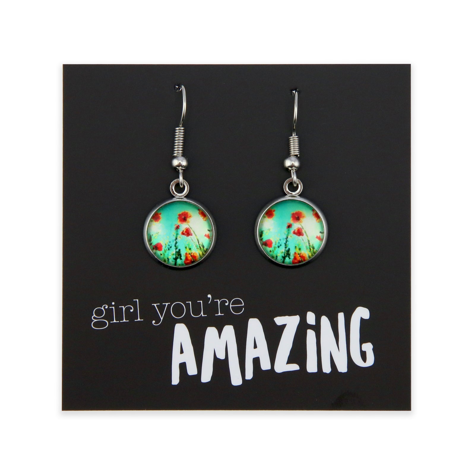 Pair of earrings with floral design on a card with 'girl you're amazing' text