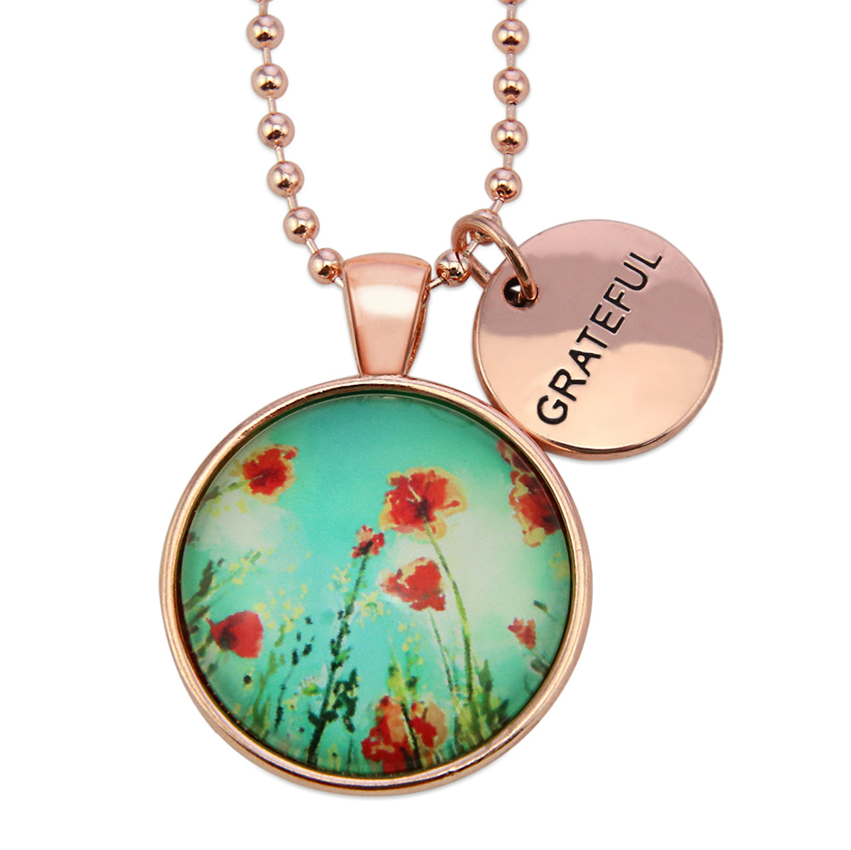 Necklace with floral pendant and 'GRATEFUL' tag on a white background