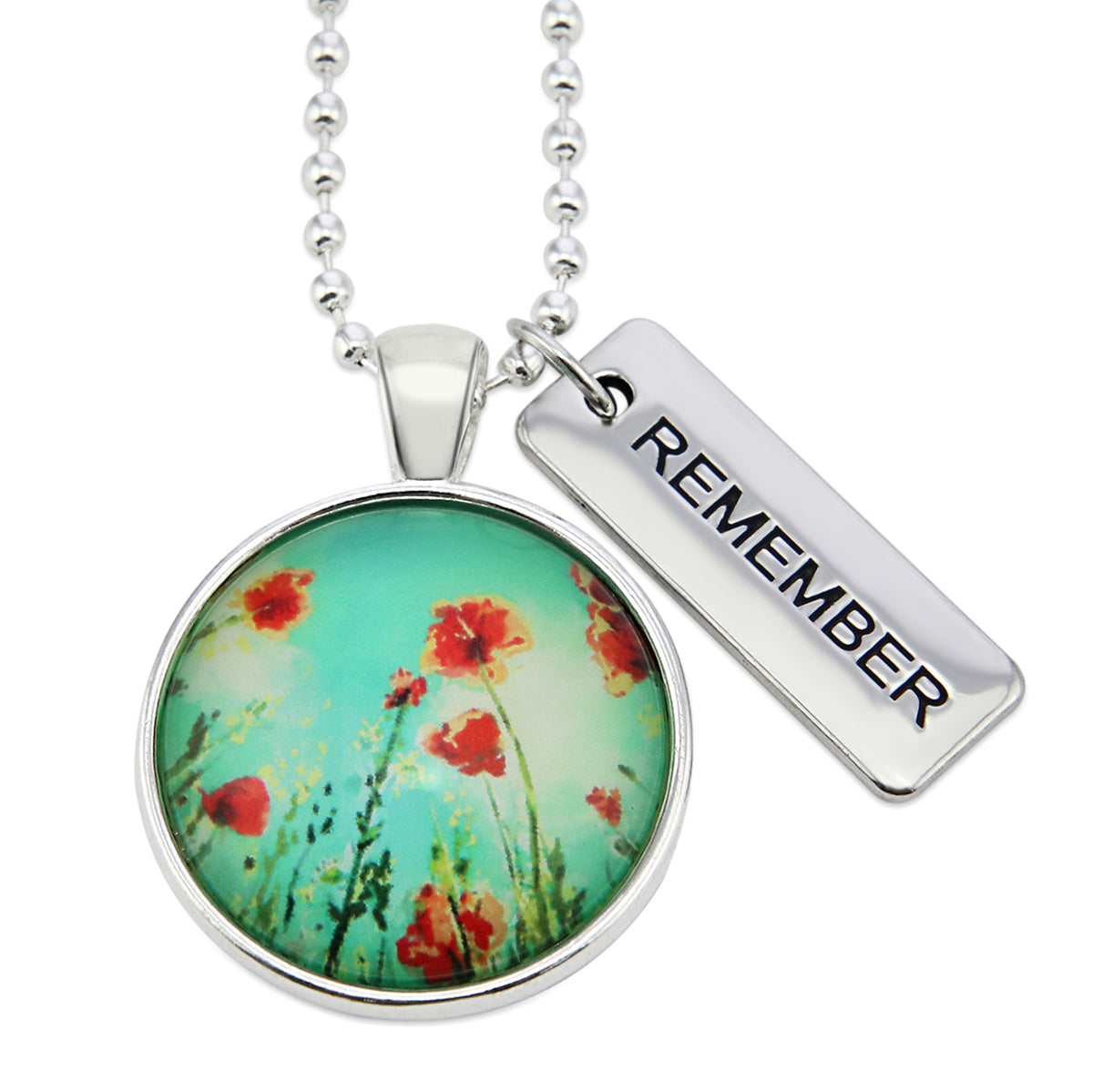 Necklace with floral pendant and 'REMEMBER' tag on a white background