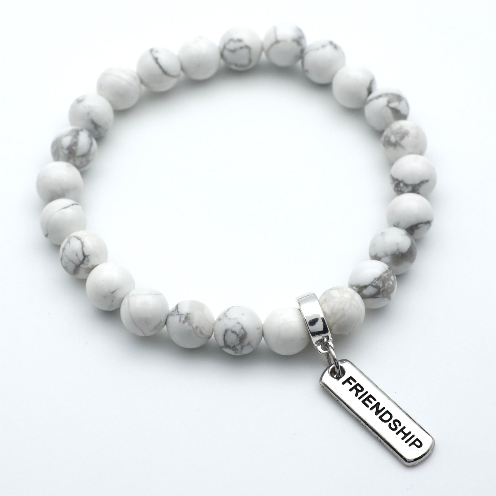 8mm White Marble Stone Bracelet with word charm and silver clip. Featured words are Soul Sister, Family, Grateful, Strength, Hope, Grace, Friendship, Loved, Courage, Brave, Embrace, Enough and many more. 