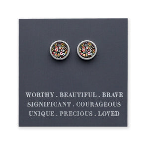 Pair of floral stud earrings on a card with motivational text