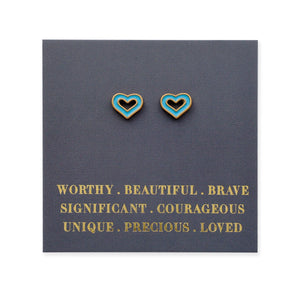Heart-shaped earrings on a card with motivational text