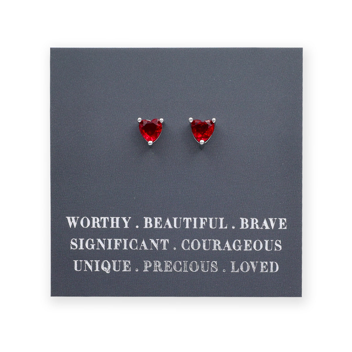 Red heart-shaped earrings on a dark gray card with motivational text