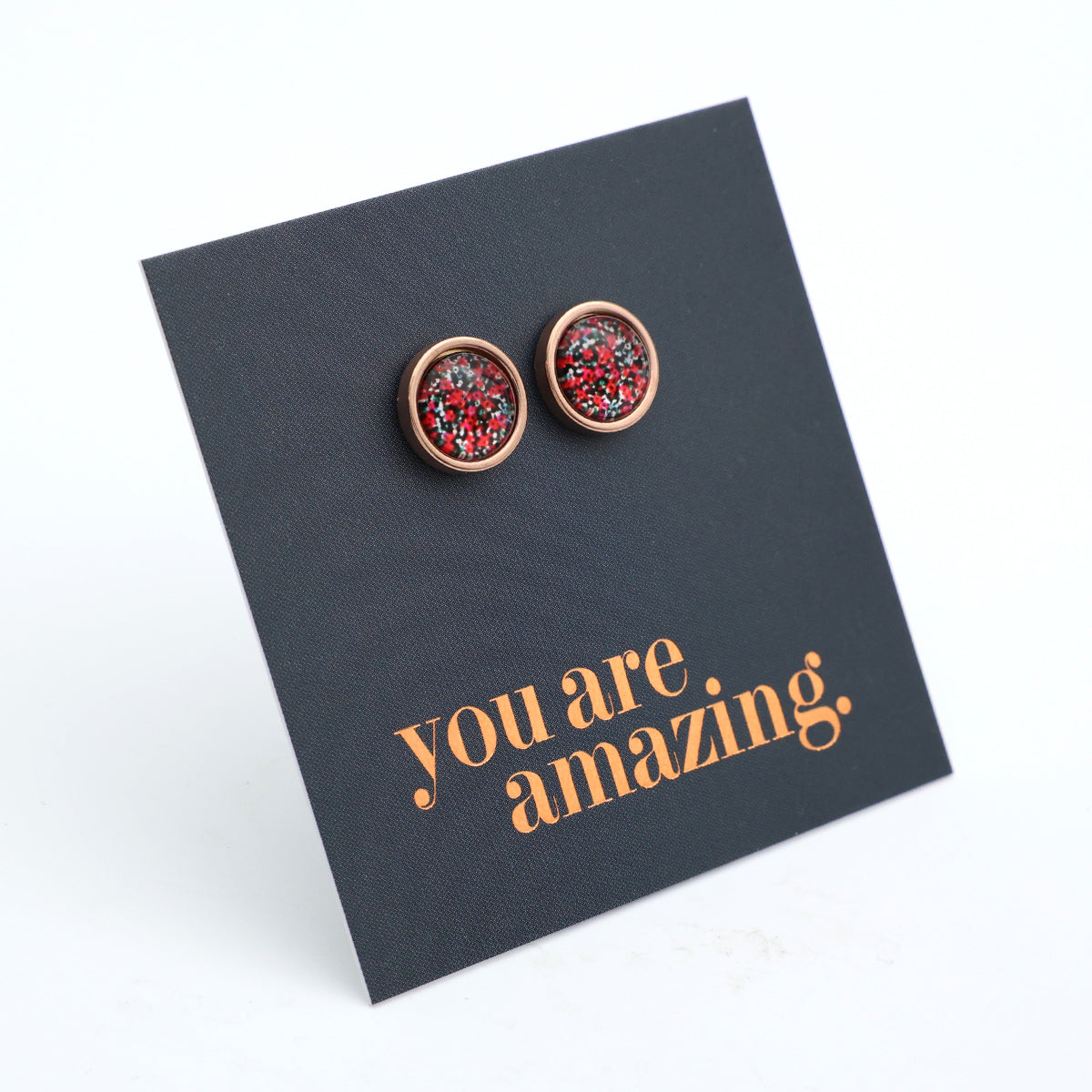 Pair of round earrings on a card with 'you are amazing' text