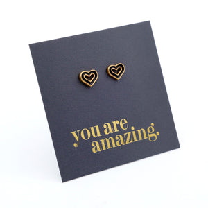 Heart-shaped earrings on a card with 'you are amazing' text