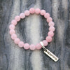 Rose Quartz 8mm stone bracelet with silver beautiful word charm and clip.