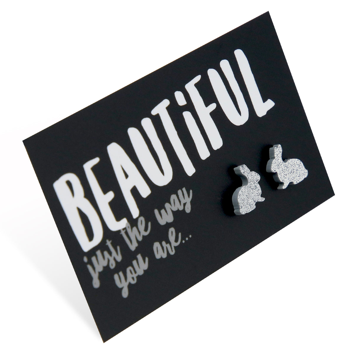 A pair of silver glitter acrylic bunny stud earrings on a black background with the text 'BEAUTIFUL just the way you are...'