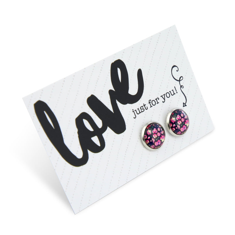 Pink floral earring stud with silver surround and presented on a love gift card.