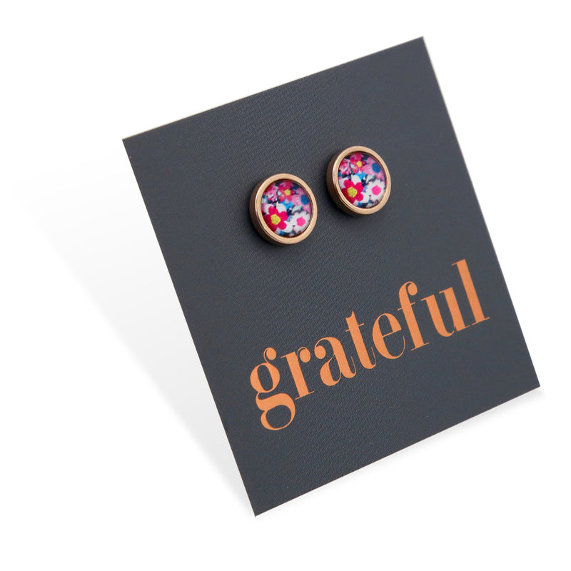 Beautiful rose gold stainless steel circle stud hypoallergenic earrings with floral print on grateful gift card.     