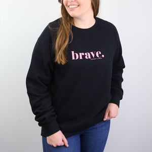 Black Women's Crew Neck Jumper Loungewear with pink Brave Print. Corporate fundraiser for The National Breast Cancer Foundation. 