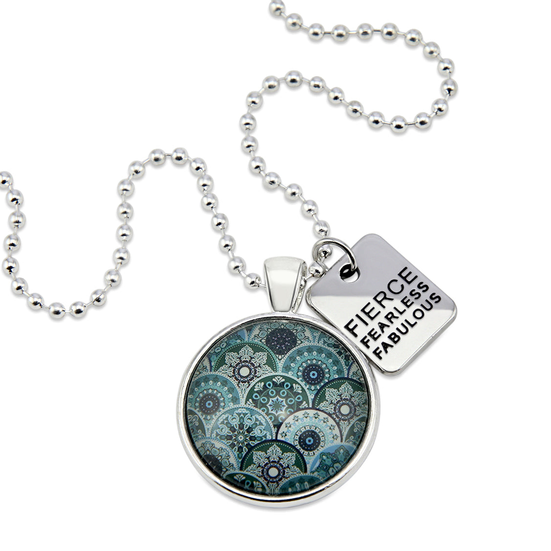 Teal print mandala pendant necklace in bright silver with fierce fearless fabulous charm. 