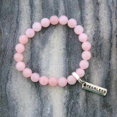 Rose Quartz 8mm stone bracelet with silver fearless word charm and clip.