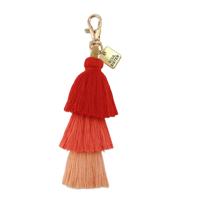 Tassel Keyring / Bag Accessory in shades of red and orange with gold Soul Sister word charm and clasp.