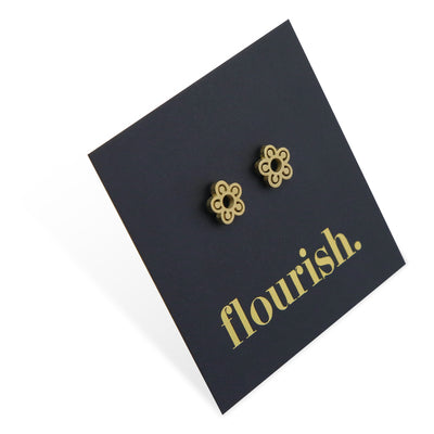 Flower Power studs in gold stainless steel on a foil flourish card.