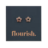 Flower Power studs in rose gold stainless steel on a foil flourish card.