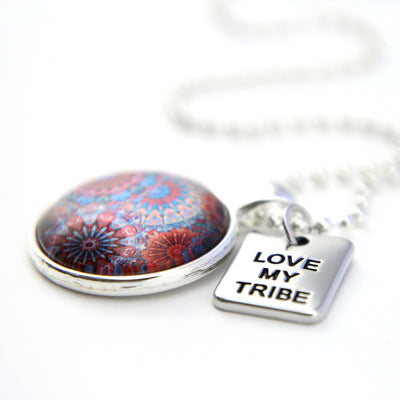Blue, orange and red pattern print pendant necklace with bright silver ball chain and Love My Tribe word charm.