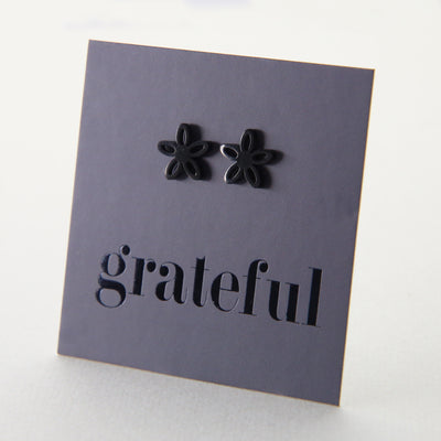 Stainless Steel Geo flower shape earrings. Hypoallergenic studs in Rose Gold, Silver, Black & Gold. Star shaped. Beautiful Gifts by Sister and Soul. Foil feature gift card Girl you are amazing.