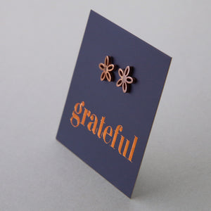 Stainless Steel Geo flower shape earrings. Hypoallergenic studs in Rose Gold, Silver, Black & Gold. Star shaped. Beautiful Gifts by Sister and Soul. Foil feature gift card Girl you are amazing.