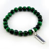 Green tigers eye bead bracelet 8mm sized beads with silver strength cute charm.