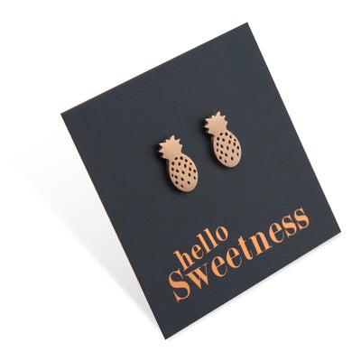 rose gold stainless steel pineapple studs on foil hello sweetness