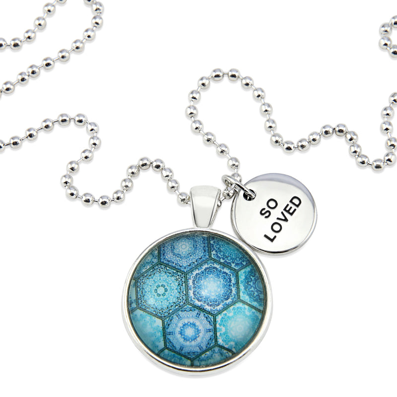 Teal hexagon print pendant necklace in bright silver with so loved charm. 