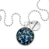 Teal print hummingbird pendant necklace in bright silver with courage charm.