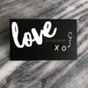 X&0s earring studs in gold on Love just for you card