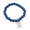 The STRONG WOMEN Collection Hematite Bracelet 8mm Beads with word charm - Brilliant Blue
