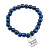 The STRONG WOMEN Collection Hematite Bracelet 8mm Beads with word charm - Brilliant Blue