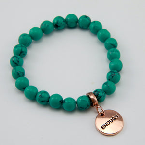 Teal coloured stone bead bracelet with rose gold charm