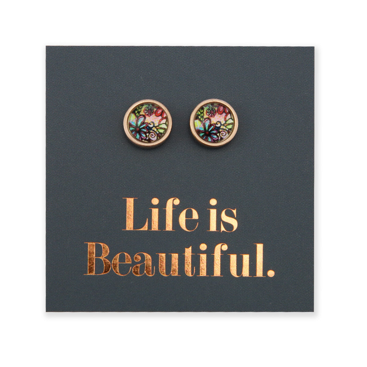 A pair of rose gold stainless steel circle stud earrings with a floral pattern, displayed on a card with the text 'Life is Beautiful'.