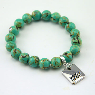 Teal coloured stone bead bracelet with meaningful word charm.