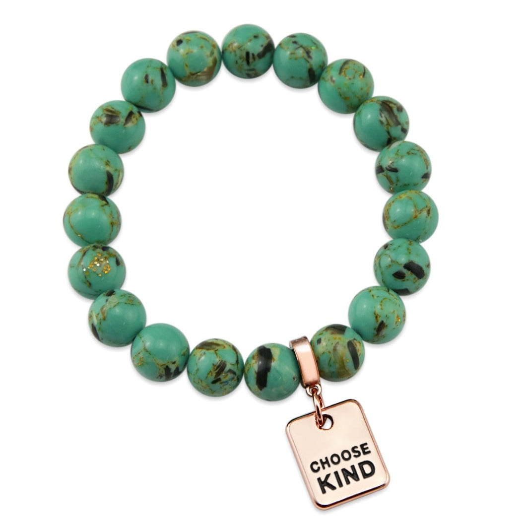 Teal coloured stone bead bracelet with rose gold word charm. 