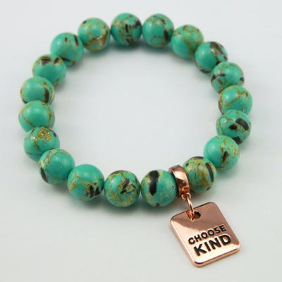 Teal coloured stone bead bracelet with rose gold word charm.