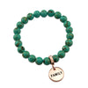 Lightteal stone bead bracelet with rose gold meaningful word charm.
