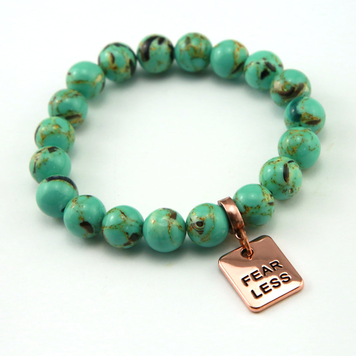 Teal coloured stone bead bracelet with rose gold word charm. 