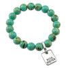 Teal coloured stone bead bracelet with meaningful word charm.