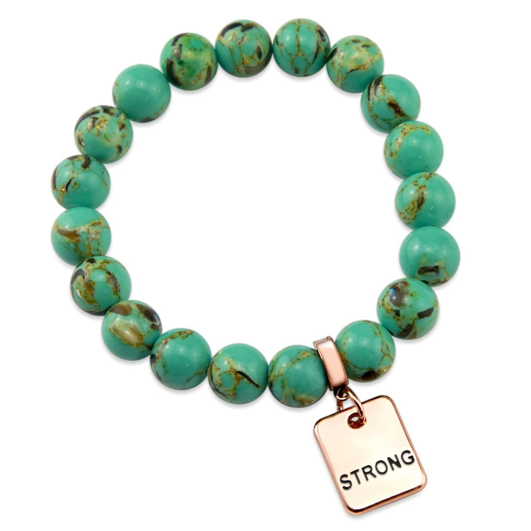 Teal coloured stone bead bracelet with rose gold word charm. 