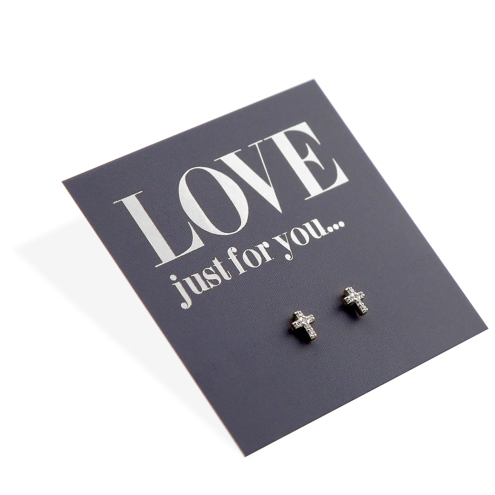 The image shows a pair of sterling silver stud earrings with a tiny cross design, presented on a card with the text 'LOVE JUST FOR YOU.
