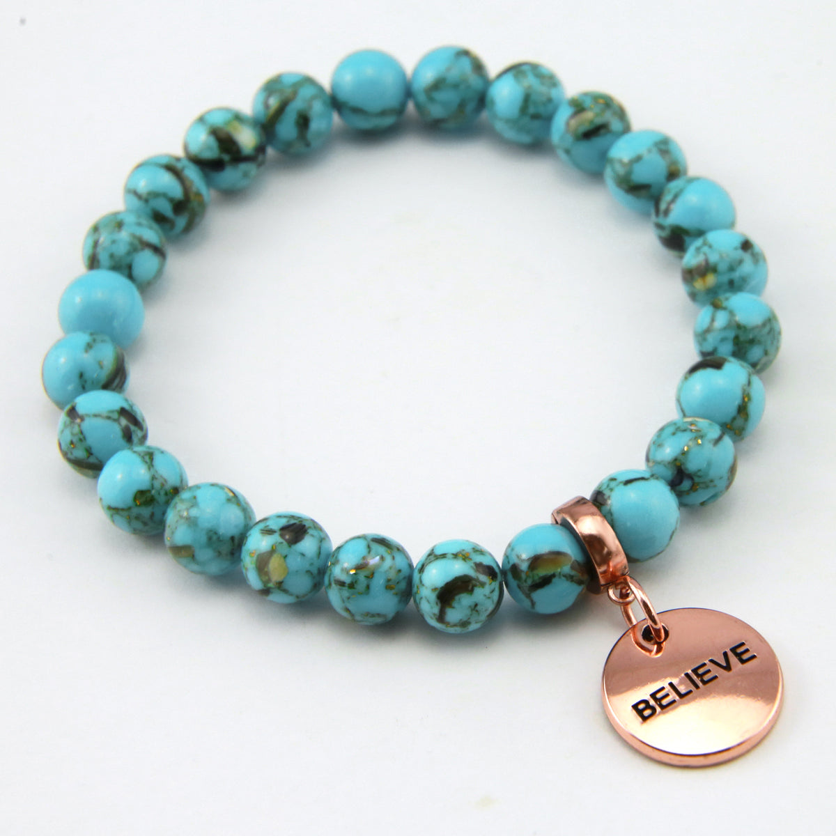 Teal coloured stone bracelet with word charm and rose gold clip. 