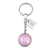 Pink rainbow print set in vintage dsilver keyring accessory with you got this charm.