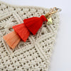 Tassel Keyring / Bag Accessory in shades of red and orange with gold Soul Sister word charm and clasp.