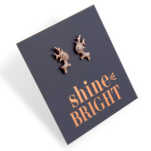 Sterling silver rose gold reindeer earring studs on shine bright card. 

